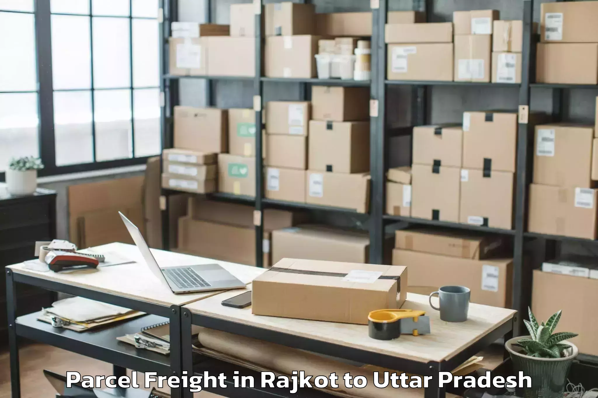 Book Rajkot to Dalmau Parcel Freight